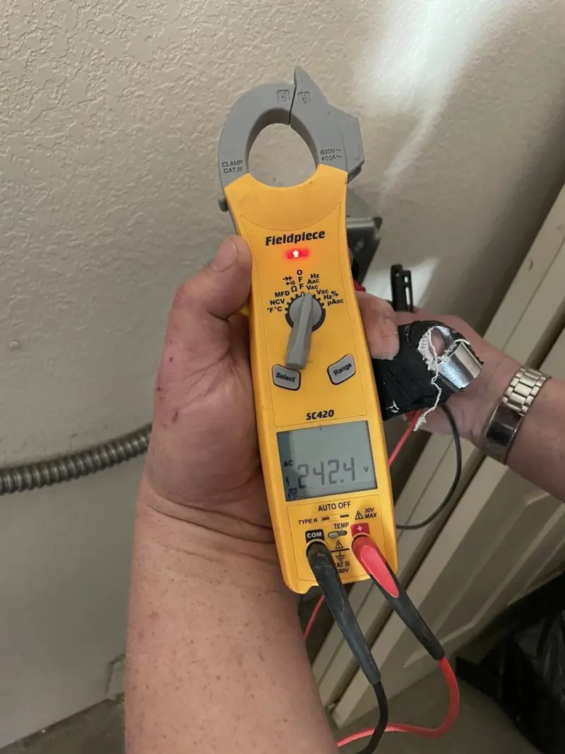 Voltage testing with clamp meter during Hot Tub / Pool Electrical Wiring in Guilford